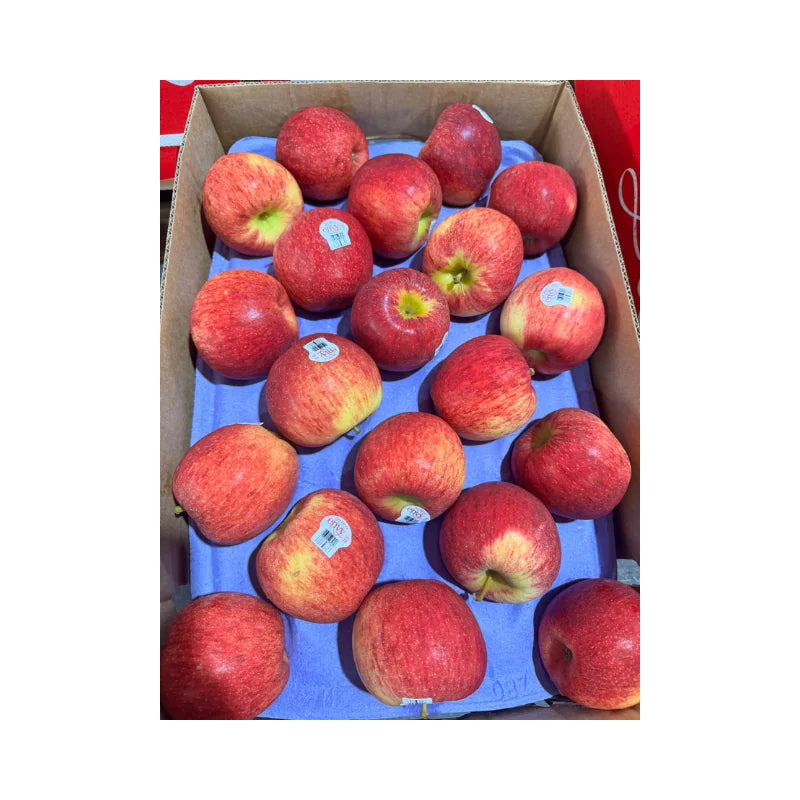 Box of red apples on a white background