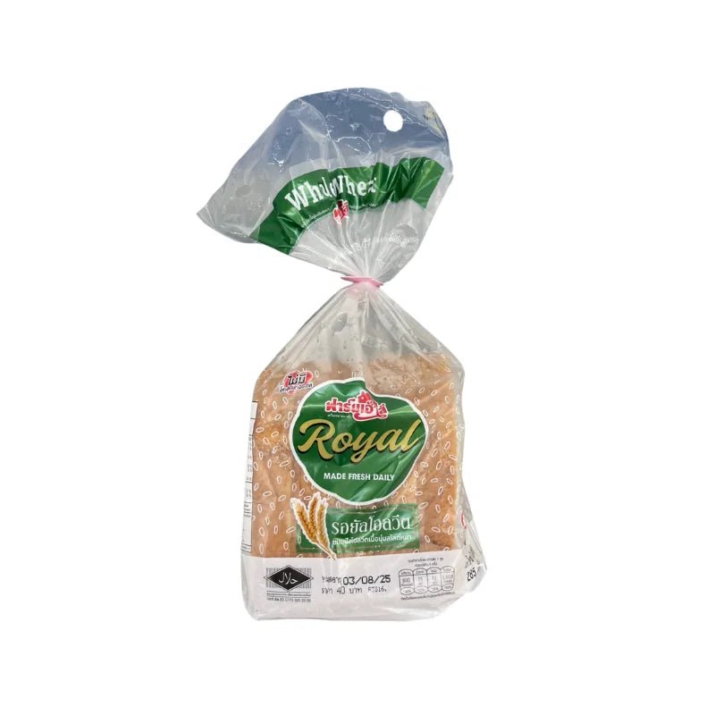 Farmhouse royal whole wheat bread loaf on a white background