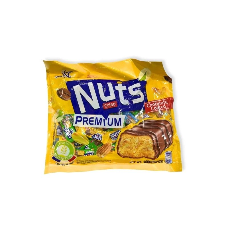 Chocolate-coated compressed nuts, crunchy sweet nut snack, 400g pack isolated on white background