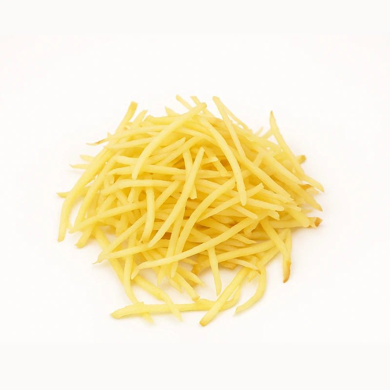 Shredded mature ginger on a white background