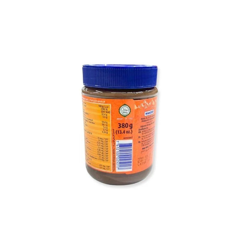 Ovomaltine crunchy chocolate spread jar on a white background