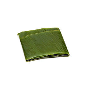 Fresh banana leaves, broad green leaves for cooking and wrapping, 250g pack isolated on white background