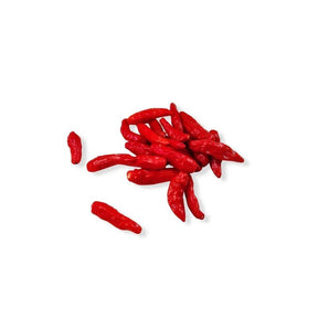 Fresh bird’s eye chili size S red with stems removed, small red chilies, 100g pack isolated on white background