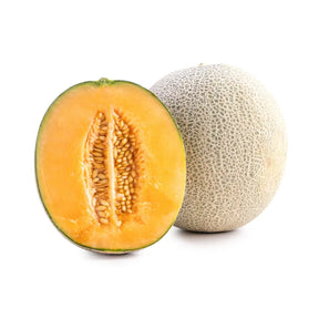 Orange-flesh cantaloupe melon on a white background
