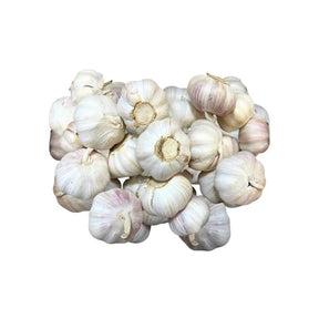 Chinese garlic whole bulbs, fresh intact garlic heads sold per kg isolated on white background