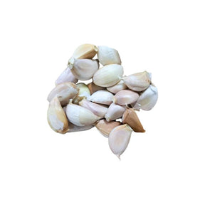 Chinese garlic whole cloves, fresh separated cloves, 100g pack isolated on white background