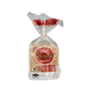 Farmhouse royal 12-grain bread loaf on a white background