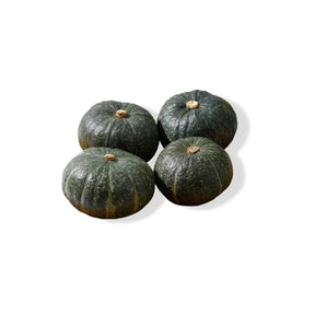Fresh mini Japanese pumpkin, small kabocha squash sold per kg isolated on white background