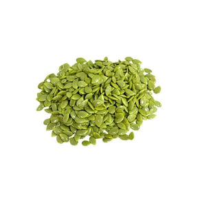 Shelled lead tree seeds on a white background