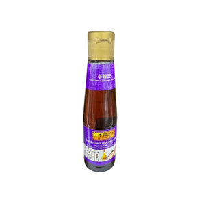 Lee Kum Kee sesame oil 207ml bottle on a white background