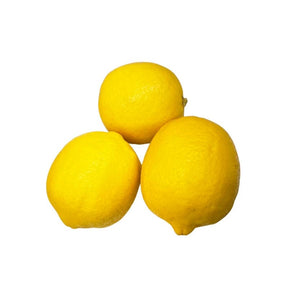Fresh lemon on a white background