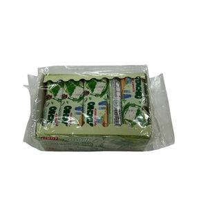 Pistachio-coated marshmallows, soft candy pieces, 24 pieces isolated on white background