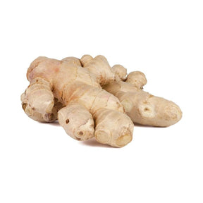 Mature ginger roots on a white background
