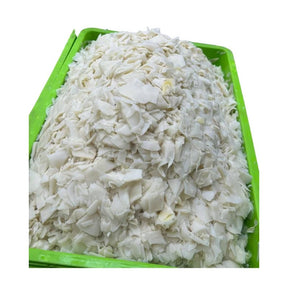 Pickled bamboo shoots chopped on a white background