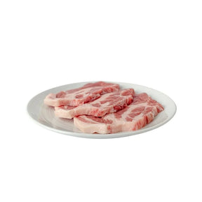 Fresh pork collar cut, marbled pork neck meat, 500g pack isolated on white background