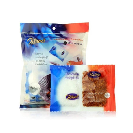 Raitip ground chilli and sugar sachets, Thai seasoning mix, 50 sachets isolated on white background