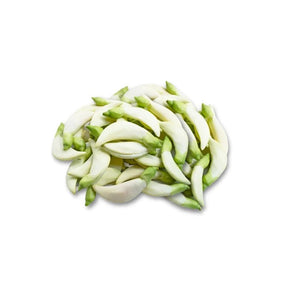 Fresh white sesbania flowers, edible white blossoms sold per kg isolated on white background
