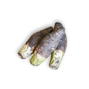 Fresh taro roots, starchy tropical tubers, 2kg pack isolated on white background