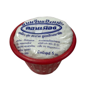 Don Mueang brand Thai rice noodles basket on a white background
