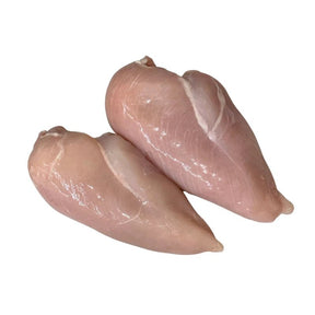 Skinless chicken breast on a white background